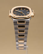 Patek Philippe Nautilus Blue Dial on Two tone 3800/001 Papers 1994