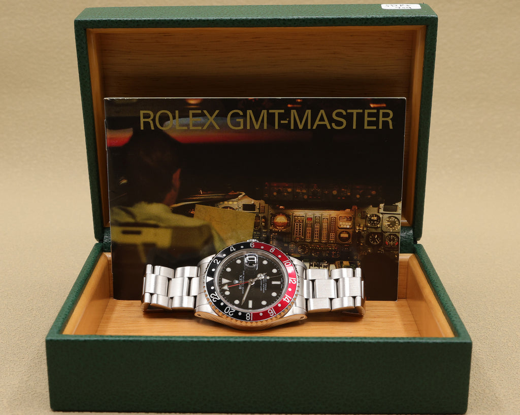 Rolex GMT-Master II Coke Black Dial on Oyster 16710 with Box 2002