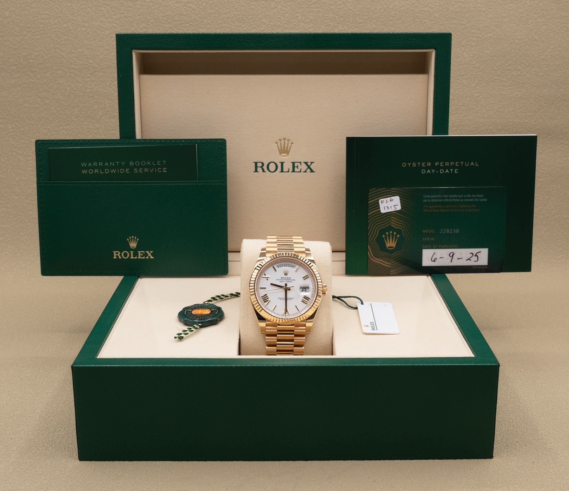 Rolex Day-Date 40 White Bevelled Roman Dial on President 228238 Complete 2025